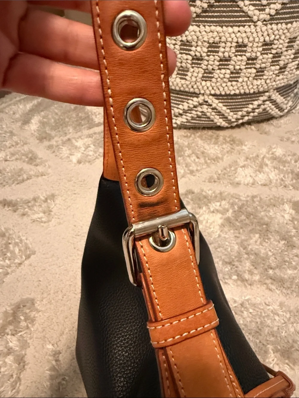Dooney & Bourke Black and Tan Pebbled Leather Hobo with Tassel